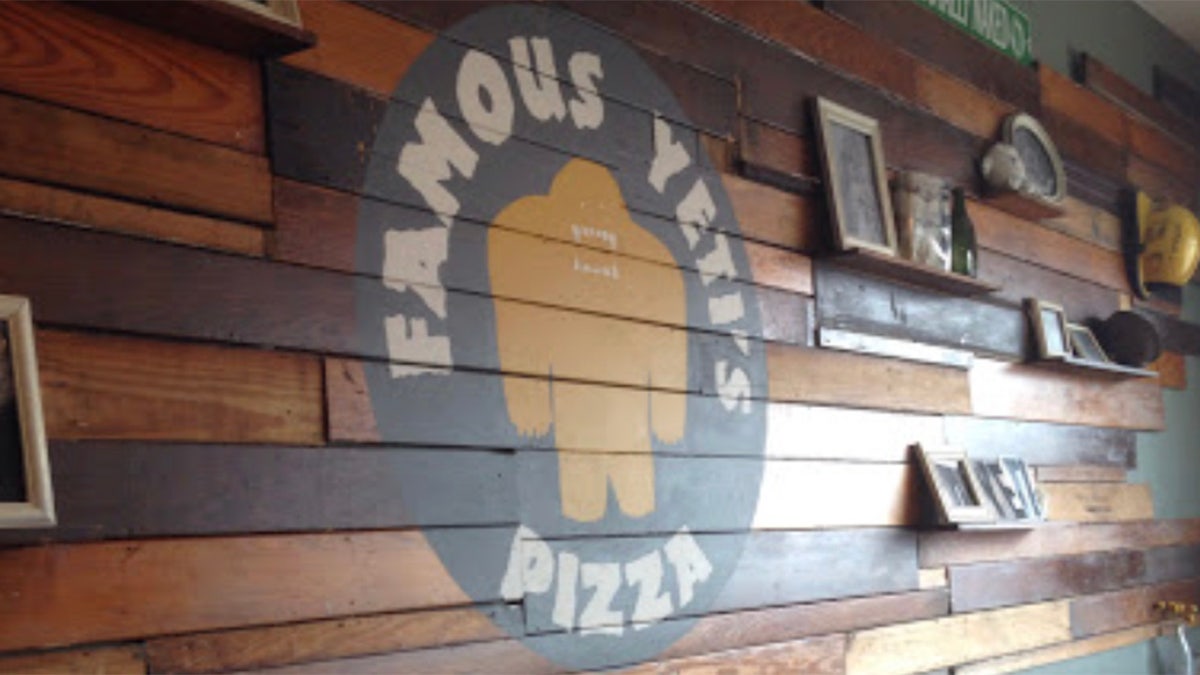 Famous Yeti's Pizza logo.